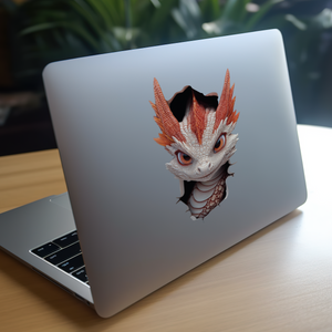 White and Red Dragon Decal on laptop