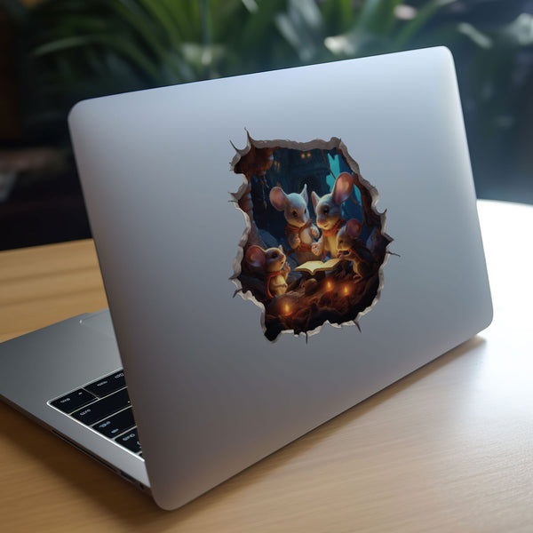 Reading mouse family decal on laptop